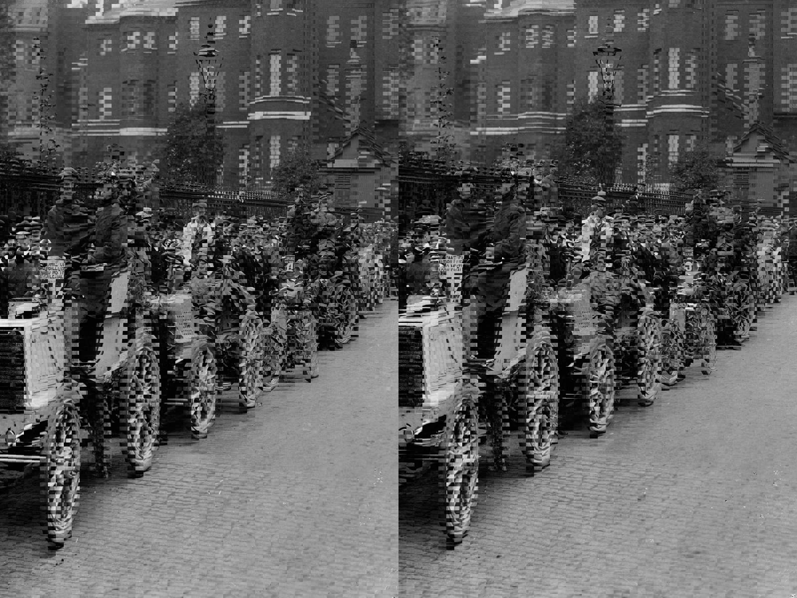 archive early motoring picture of the 1000 mile trial with veteran vehicles in a line