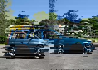 Blue Volvo 850S Estate from the Gavin and Stacey TV series picture outside at the National Motor Museum