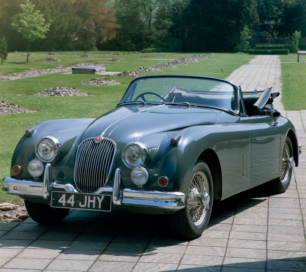 A 1960 Jaguar XK 150 in the abbey ruins at Beaulieu
