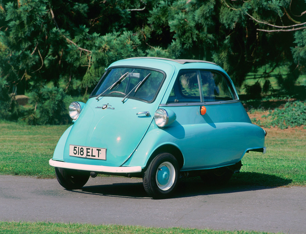 A blue 1962 BMW Isetta 300 three-wheel bubble car