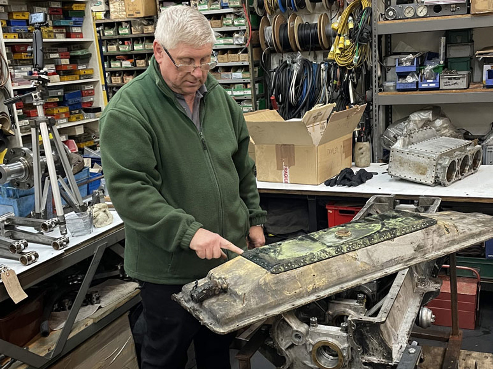 National Motor Museum Senior Engineer Ian Stanfield Shows Sump Repair Patch On Sunbeam 1000Hp Front Enginew870px H580px