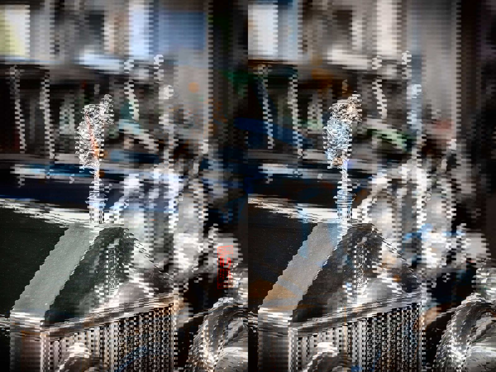 close up of the Rolls Royce whisperer car mascot