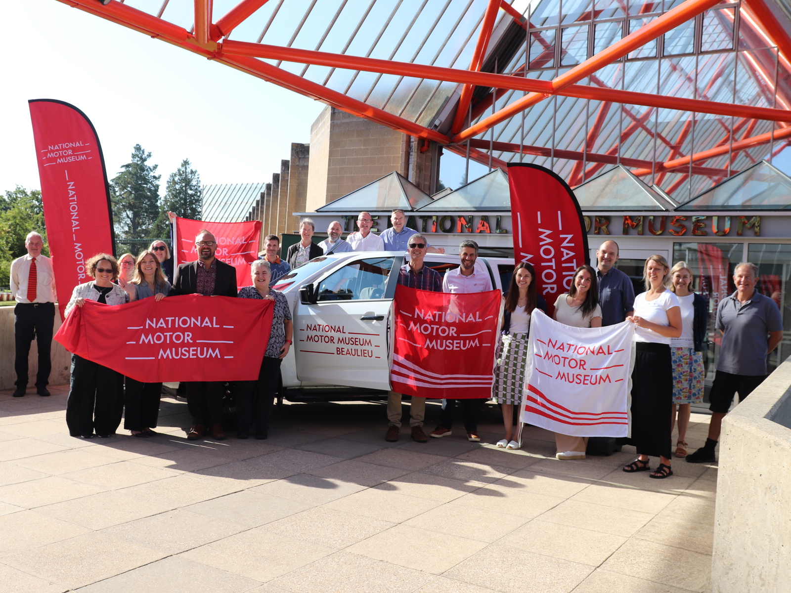 National Motor Museum Staff Celebrate The Launch Of The New Brand