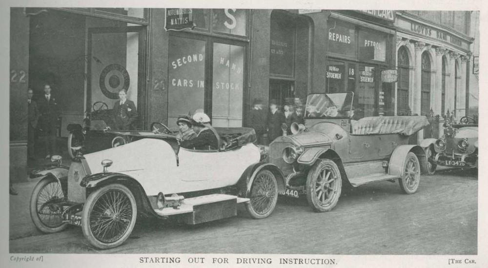 Driving instructor June Larkins giving a driving lesson to another woman