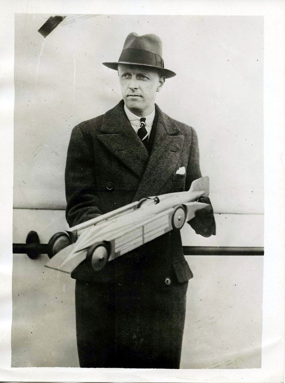 Segrave holding a model of Golden Arrow (kitchener.lord   / CC BY-NC-ND 2.0 )