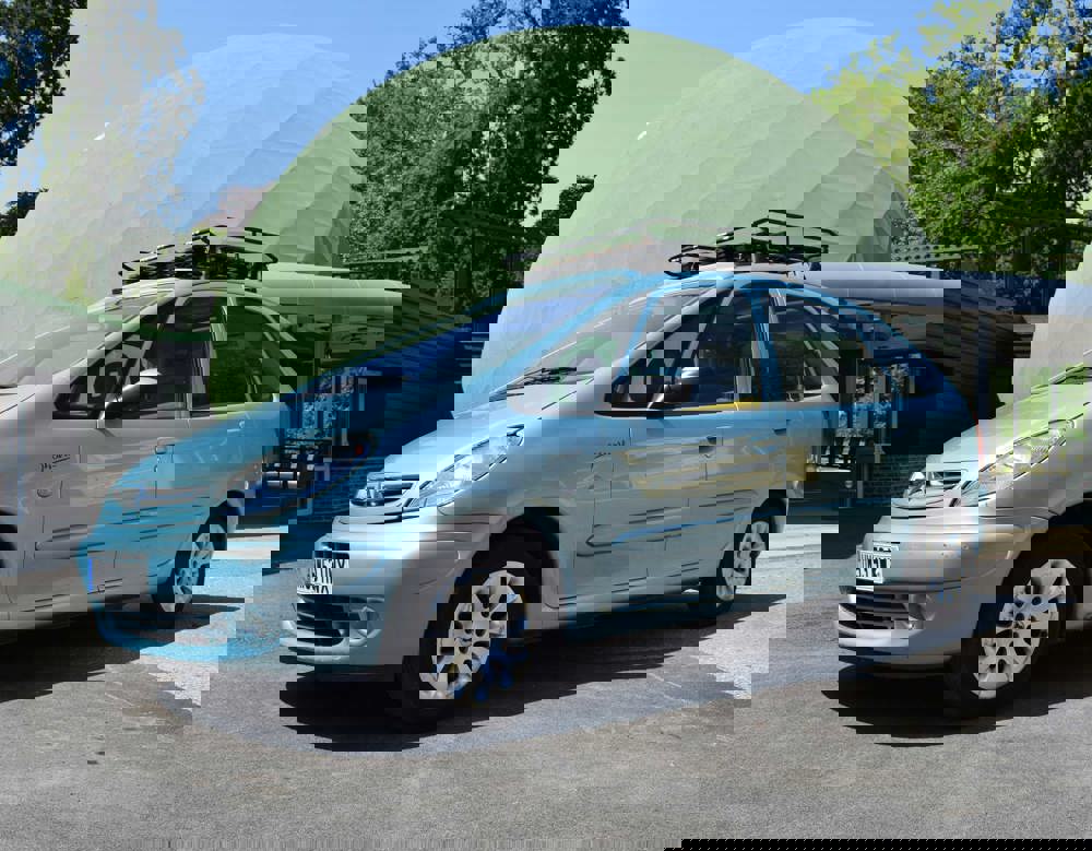 Light blue 2004 Citroen Xsara Picasso from the Gavin and Stacey TV series. Pictured near to the monorail at the National Motor Museum with a green dome in the background.