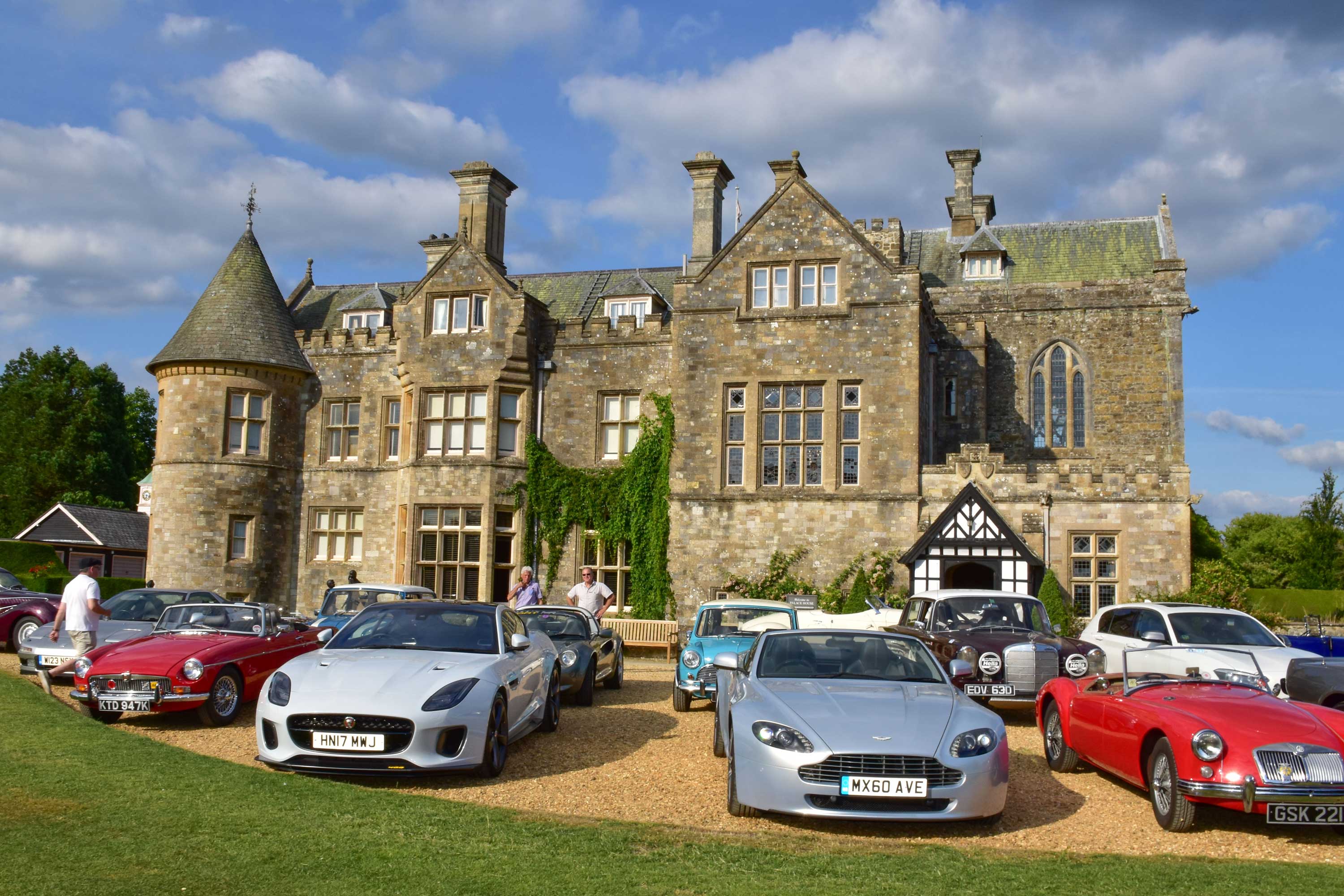 Cars lined up outside Palace House, Beaulieu, for a B100 Members day