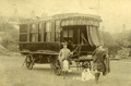 Dr William Gordon Stables in kilt in front of the the world's first leisure caravan The Wanderer built in 1885