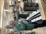 National Motor Museum Senior Engineer Ian Stanfield Inspects Engine Blocks