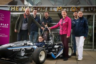 Southampton University Stag 6 and its team arrives at the National Motor Museum welcomed by Andrea Bishop