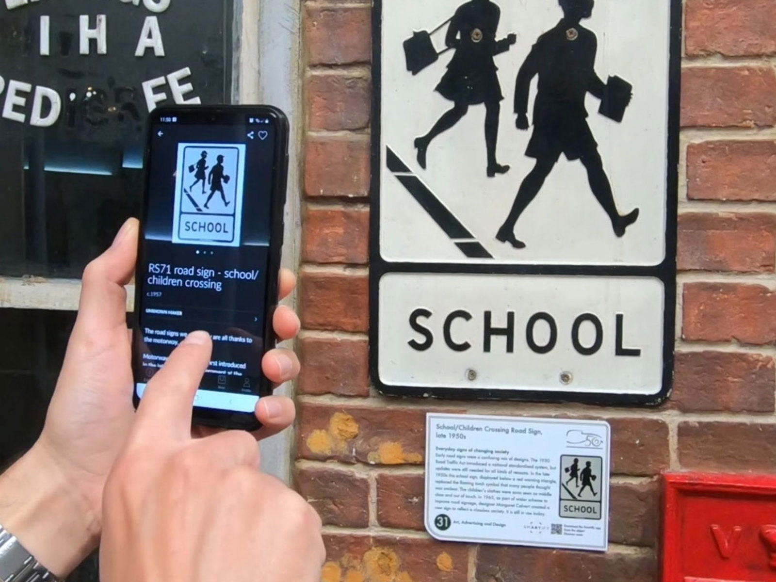 Mobile user scanning a sign with the Smartify app