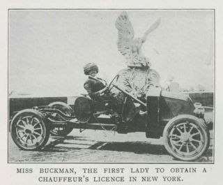 Chauffeur Miss E Buckman sitting in her car