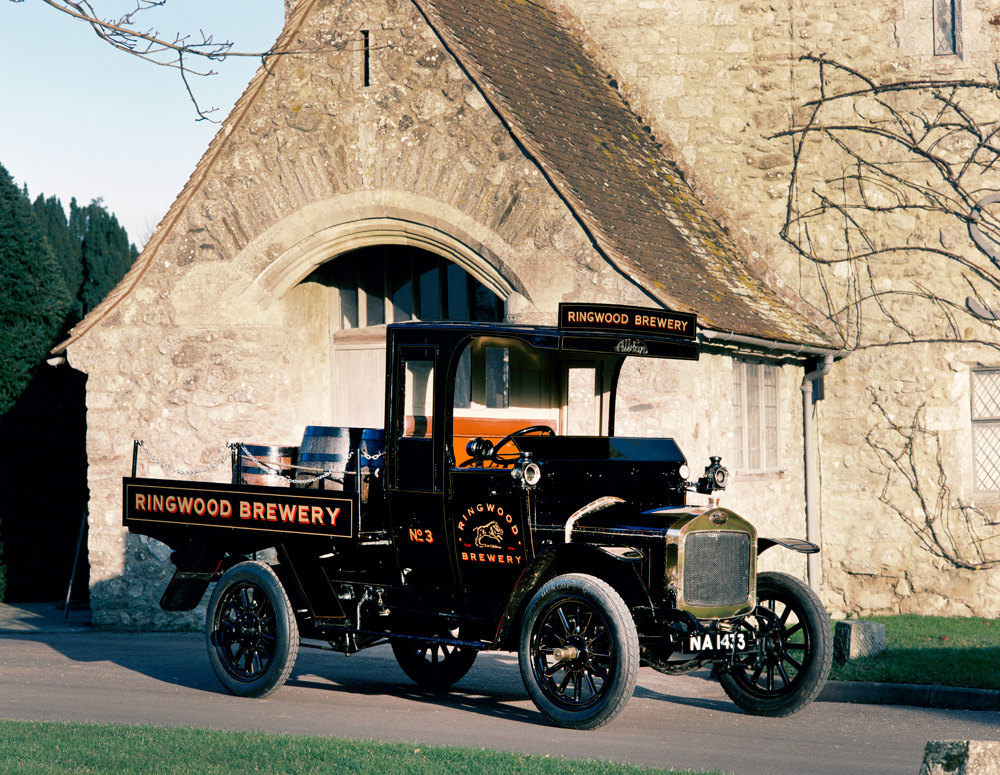 A 1914 Albion A14 flatbed truck outside the Domus at Beaulieu