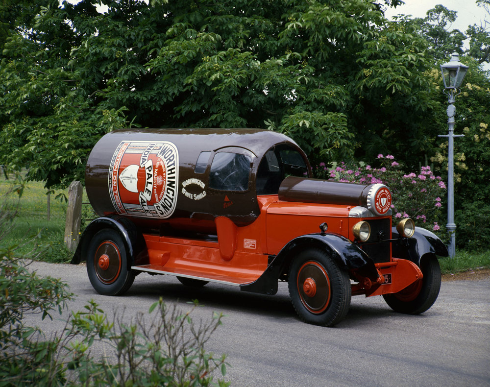 A 1924 Daimler 30hp fitted with promotional bodywork in the shape of a Worthington's beer bottle, its neck extending along the bonnet to the radiator