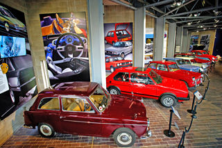 Cars in the Driving Change exhibition at the National Motor Museum