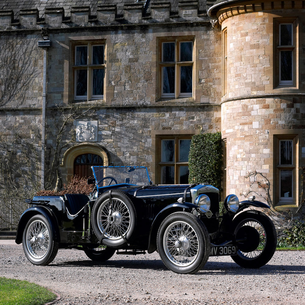 A 1932 Frazer Nash Colmore outside Palace House, Beaulieu