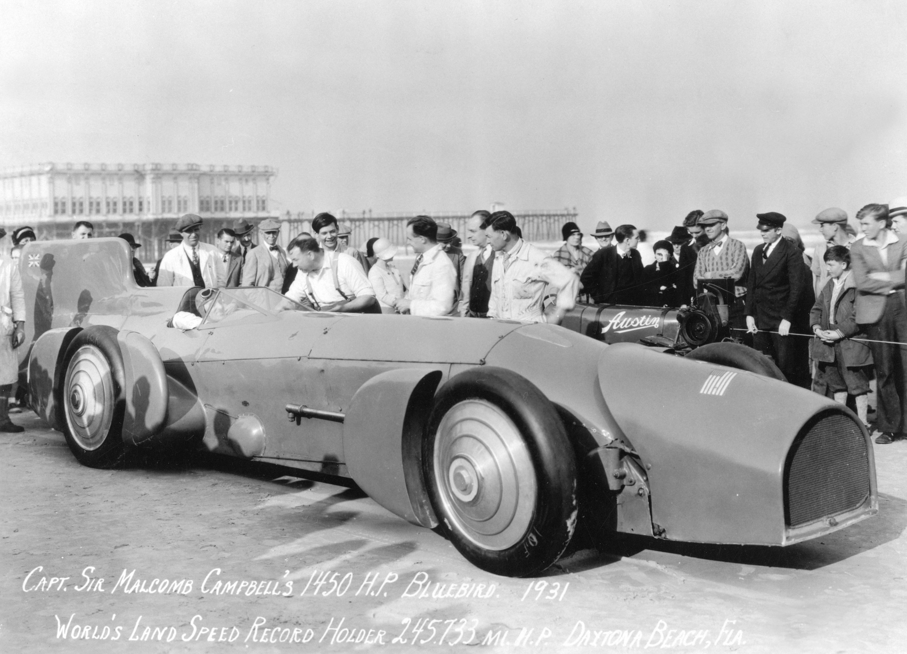 Malcolm Campbell with 1931 Bluebird at Daytona with crowd