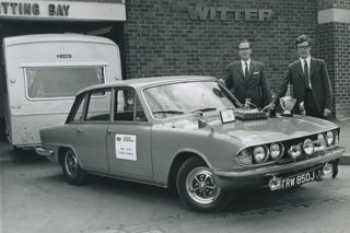 Brendan Witter (right) and co-driver Michael Stevens outside the Witter works following the duo’s overall win in 1971