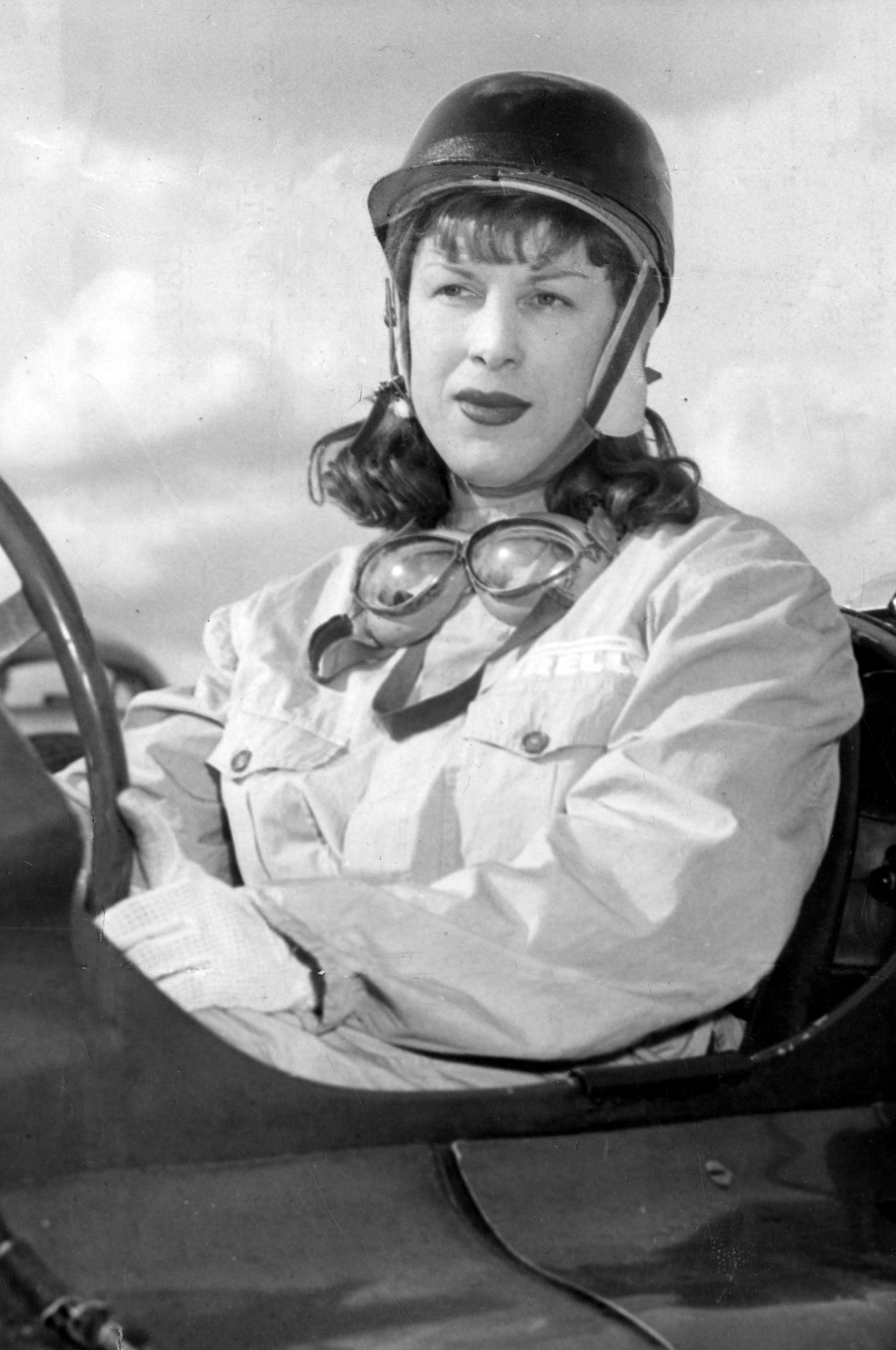 Roberta Cowell in the driving seat of race car