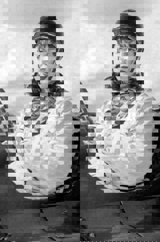 Roberta Cowell in the driving seat of race car