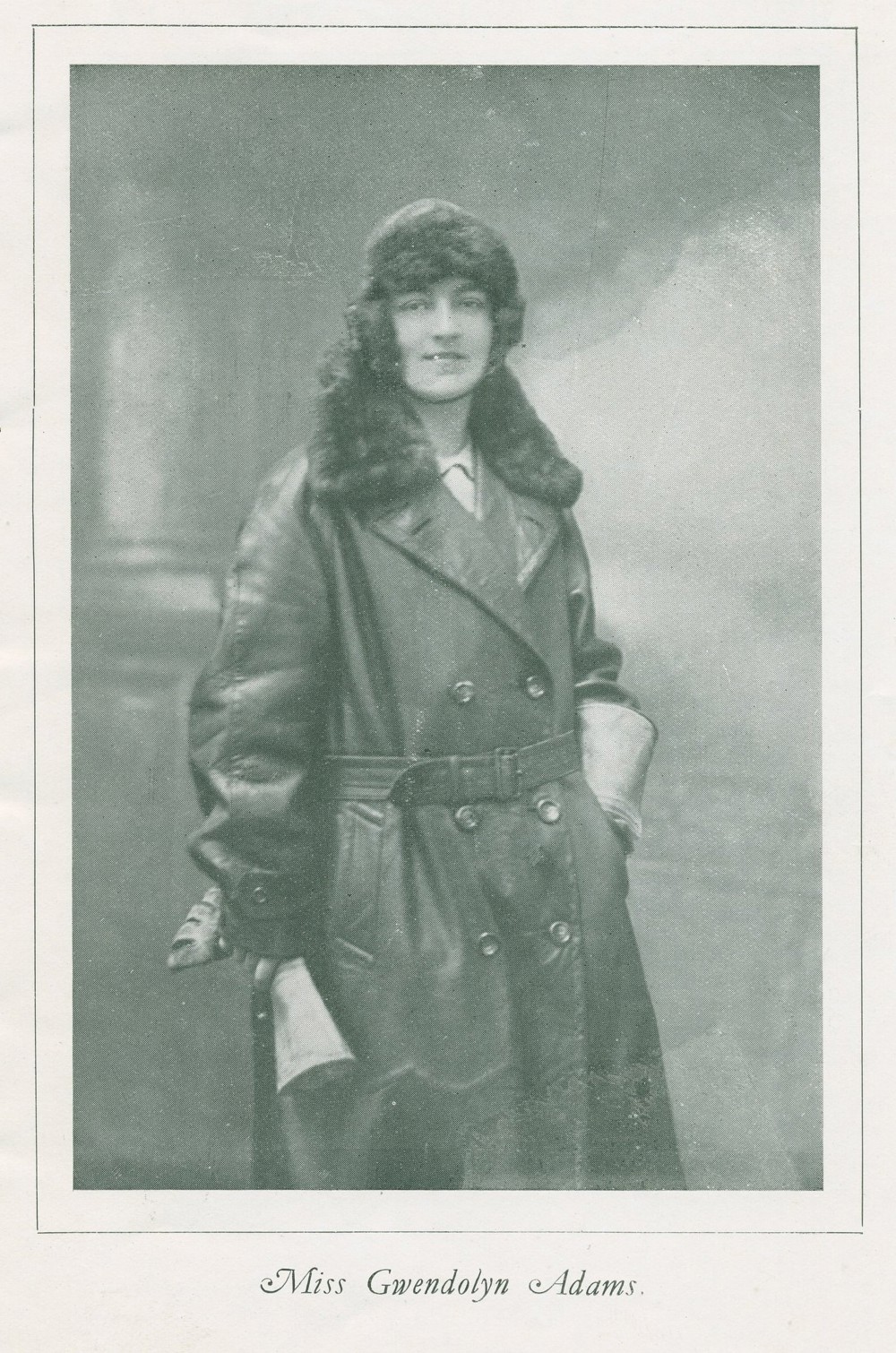 Photographic portrait of Miss Gwendolyn Adams in motorcycling outfit