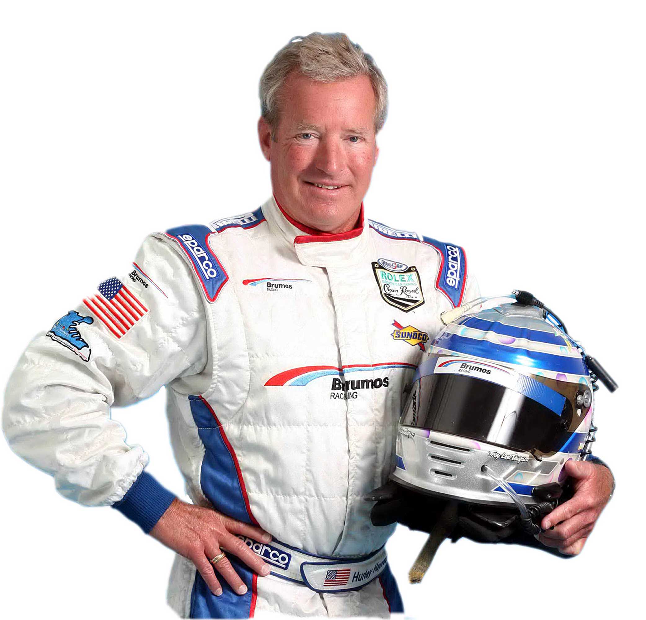 Hurley Haywood holding racing helmet