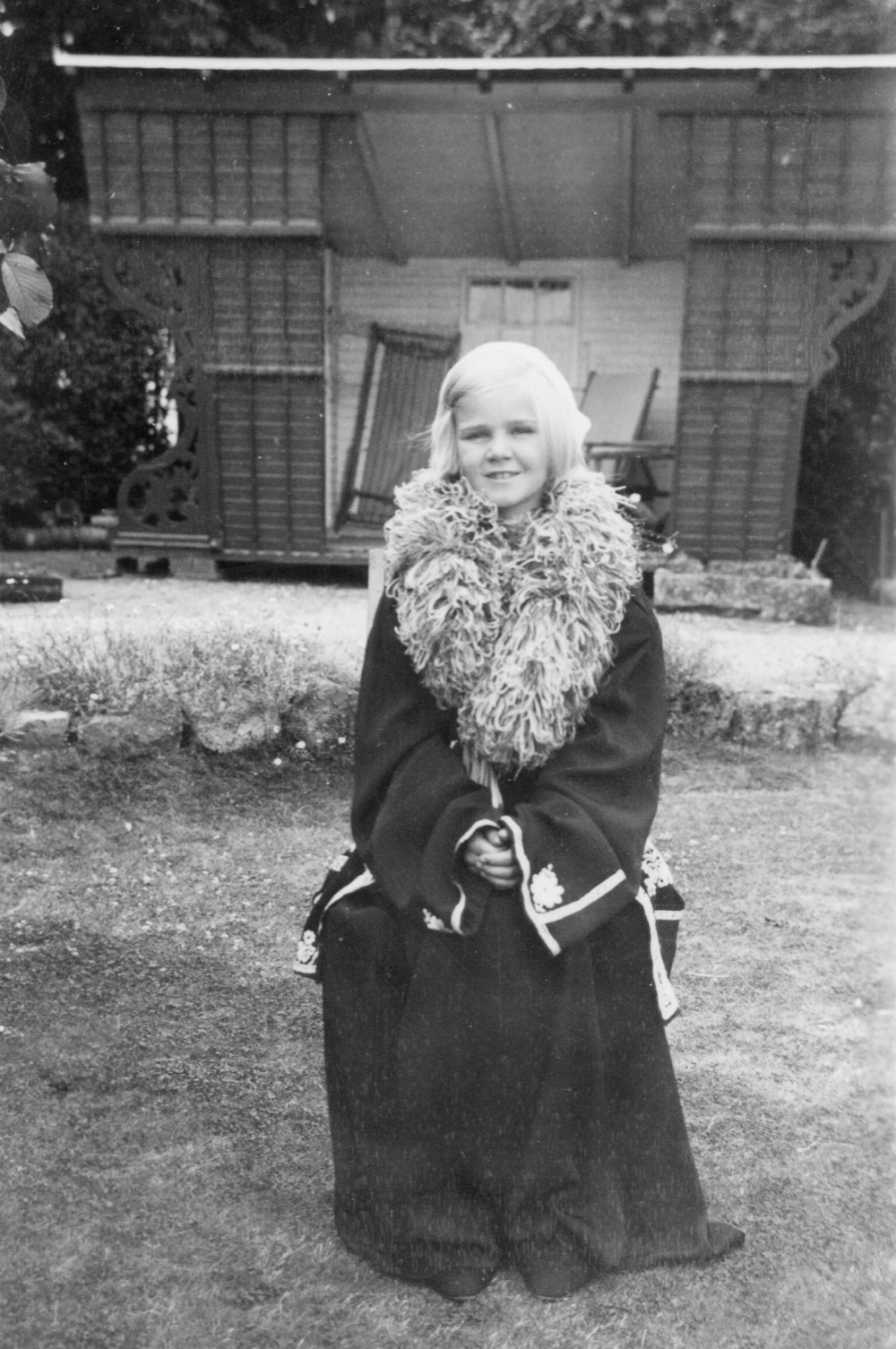 Young girl in fancy dress by The Main Gay caravan