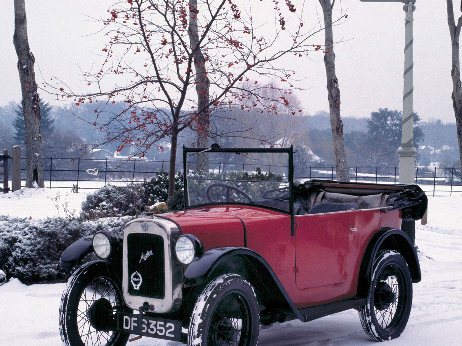 A 1928 Austin Seven Chummy vintage car in the snow