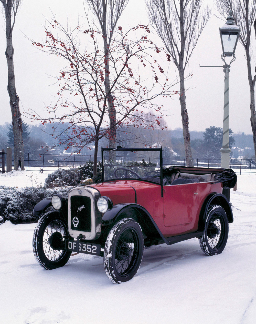 A 1928 Austin Seven Chummy vintage car in the snow