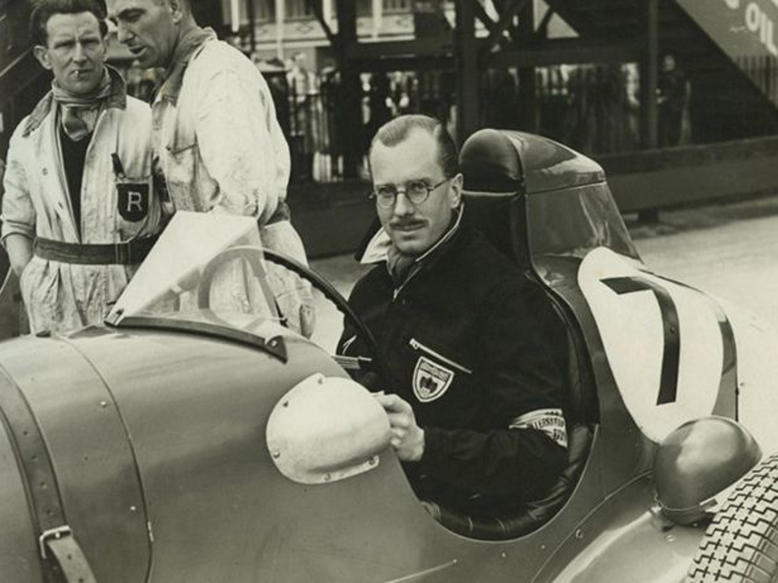 Hugh Hunter sitting at the wheel of racing car