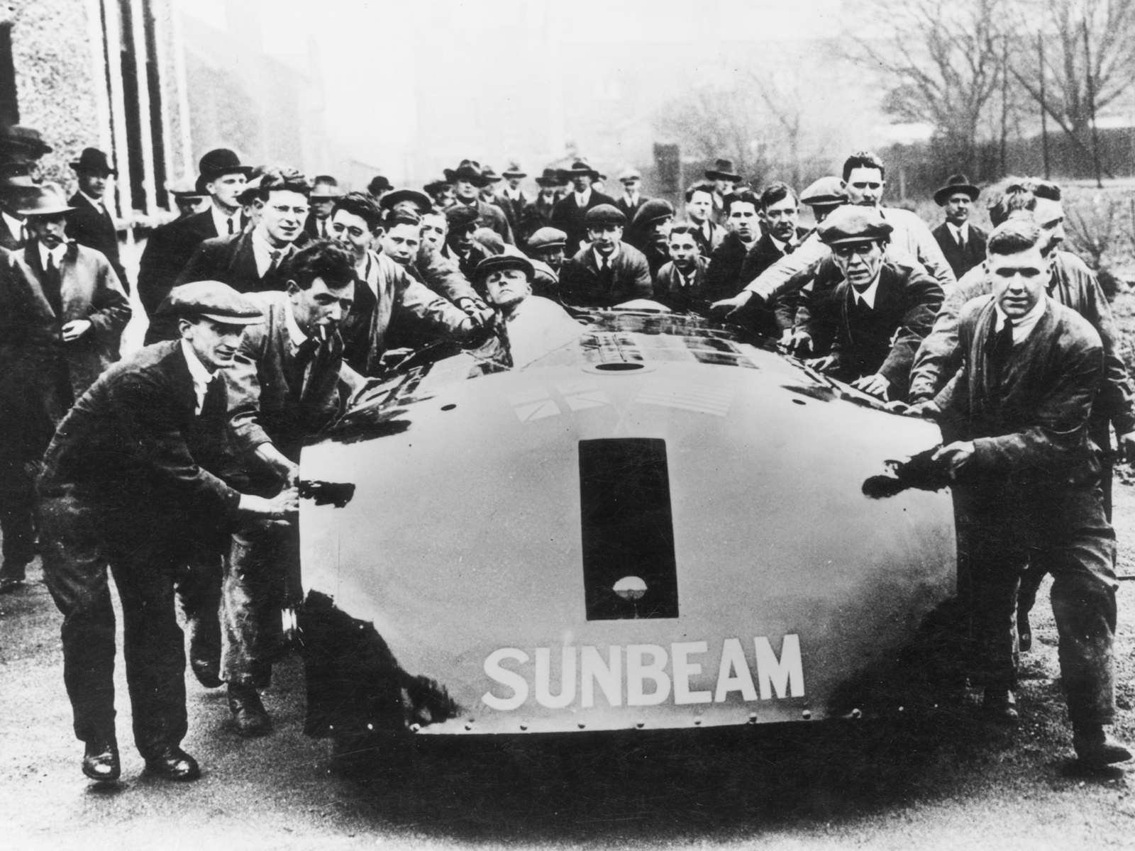 Segrave and mechanics with the Sunbeam 1000hp at the Wolverhampton factory