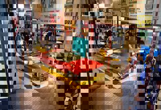 Opening of Motopia exhibition with guests in the gallery