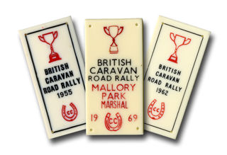 Plastic commemorative rally plaques collected by Road Rally committee member Laurie Simmons, 1950s to ’60s.