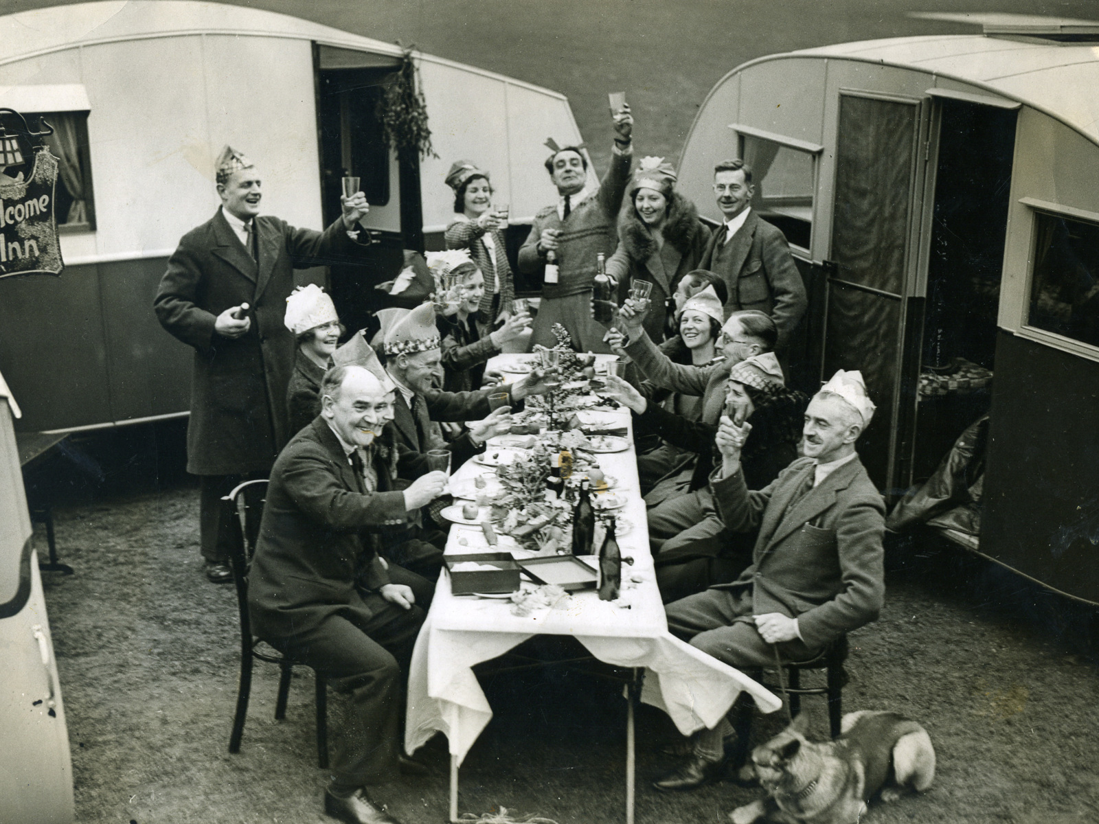 Caravan Club members having Christmas dinner amongst their caravans