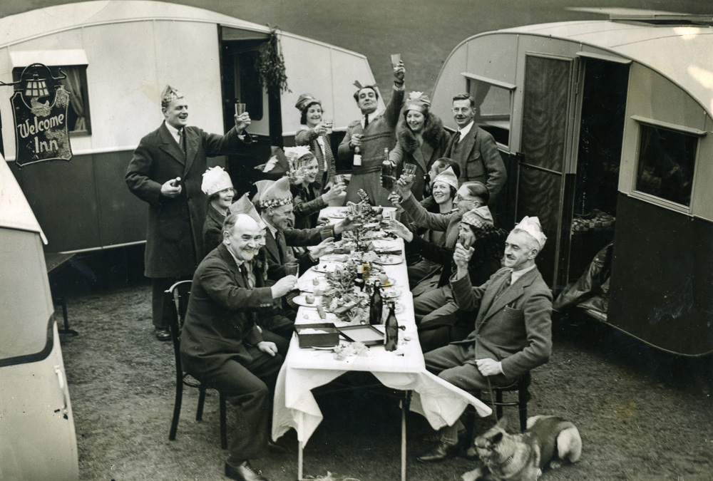 Caravan Club members having Christmas dinner amongst their caravans