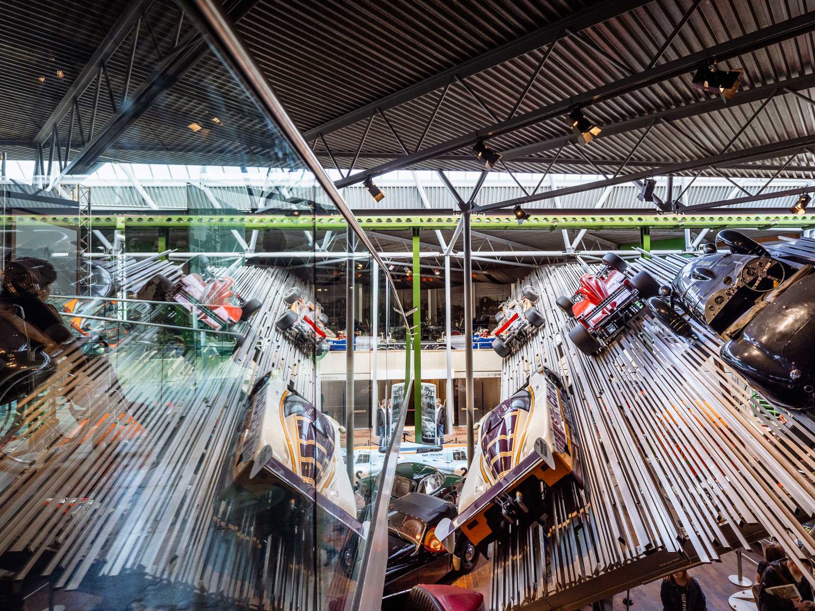 Formula 1 cars in the National Motor Museum suspended on a wall