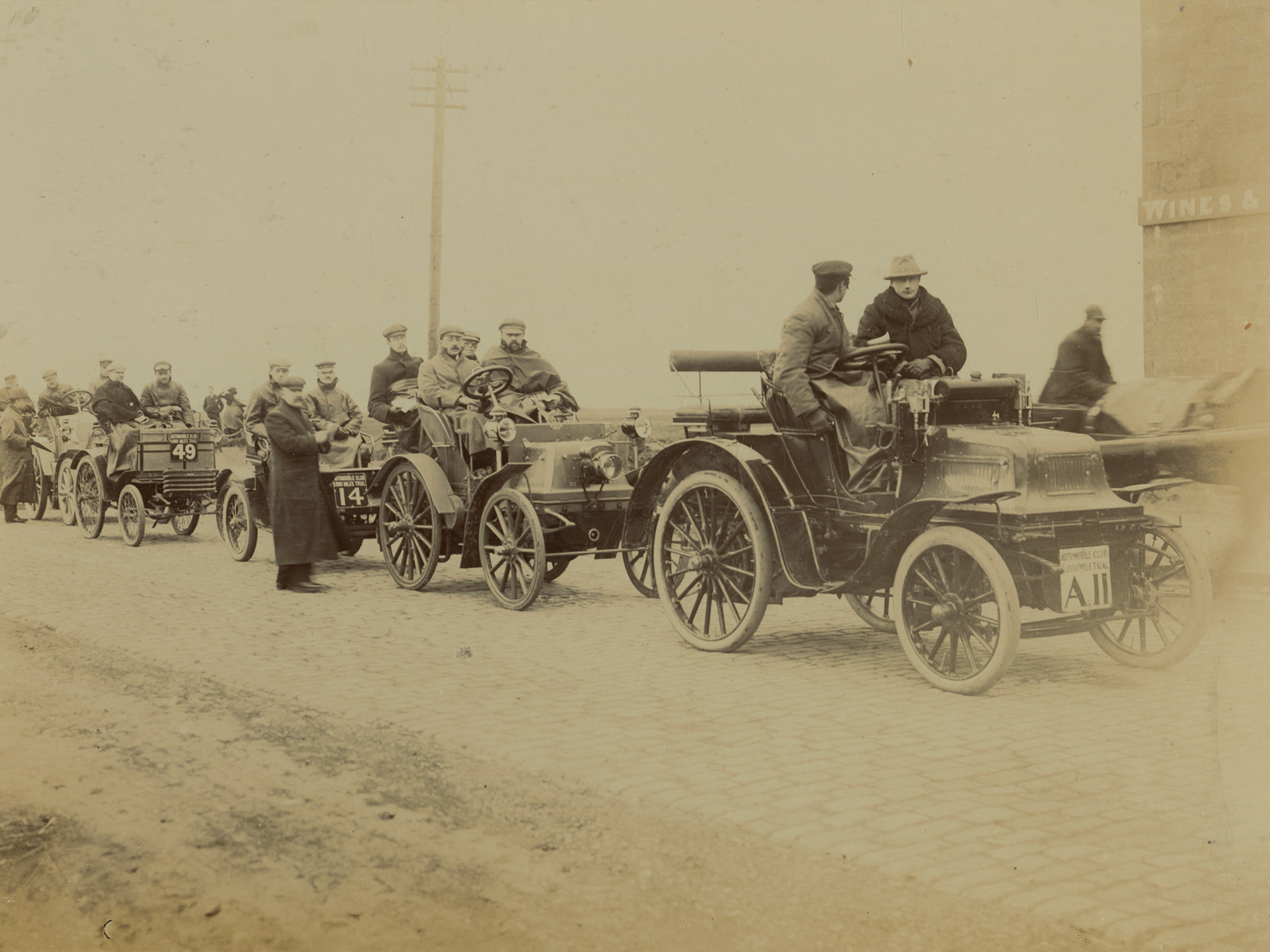 John Montagu sitting in his Daimler, with several other vehicles and drivers, about to leave Edinburgh.