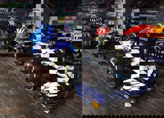 A 2021 Williams FW43B-01 formula one racing car on display in the National Motor Museum.