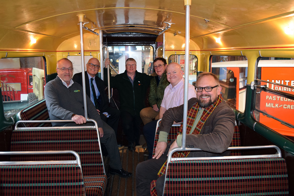 Hants and Dorset Trim team with National Motor Museum team on board the London bus