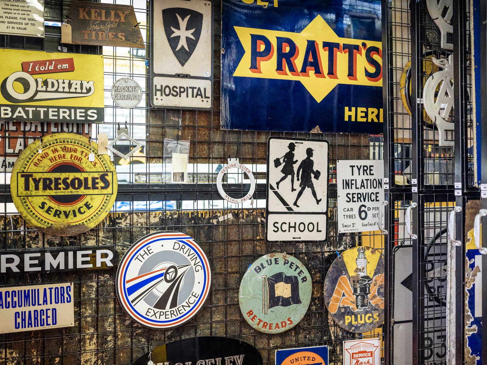 road signs on a rack in the collections store