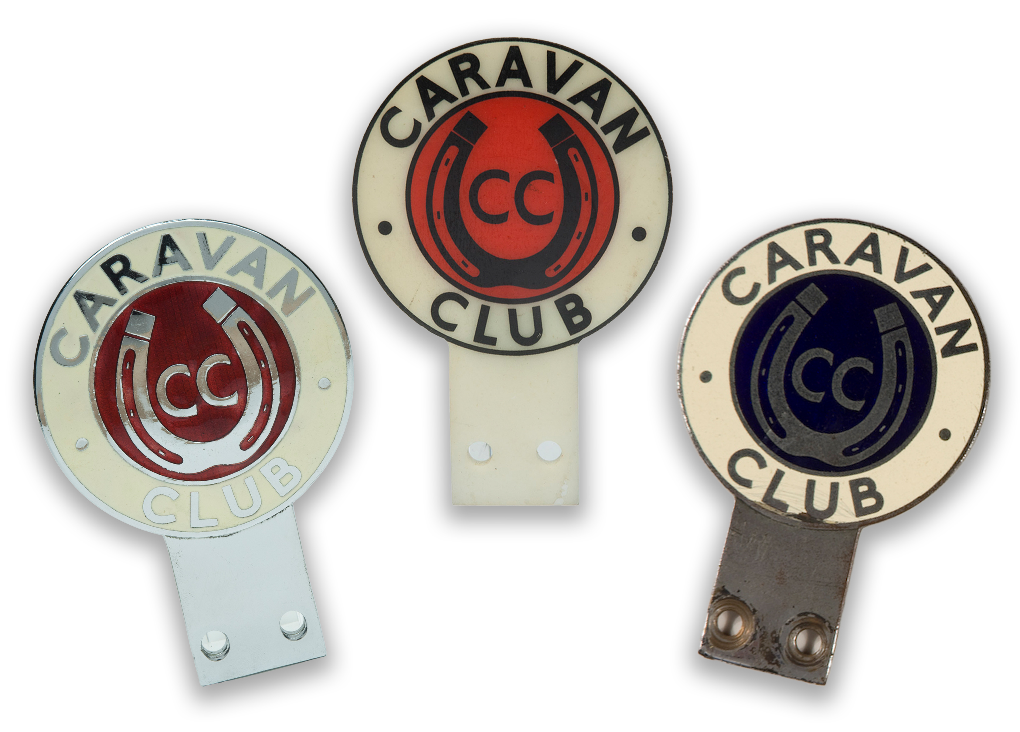 Three Caravan Club car badges, two in enamelled metal and one in plastic