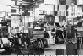 Edward Lord Montagu with historic cars in Palace House c1950s