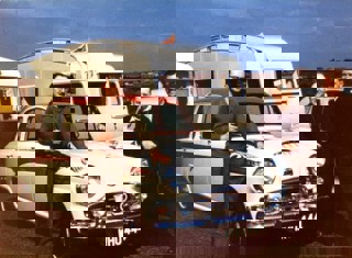 Edgar Thorne pictured far left with his Austin A105 and Ensor Elect Caravan at the 1959 British Caravan Road Rally.