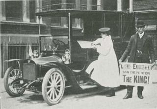 The Pankhursts' chauffeur Vera ‘Jack’ Holme and man by a car