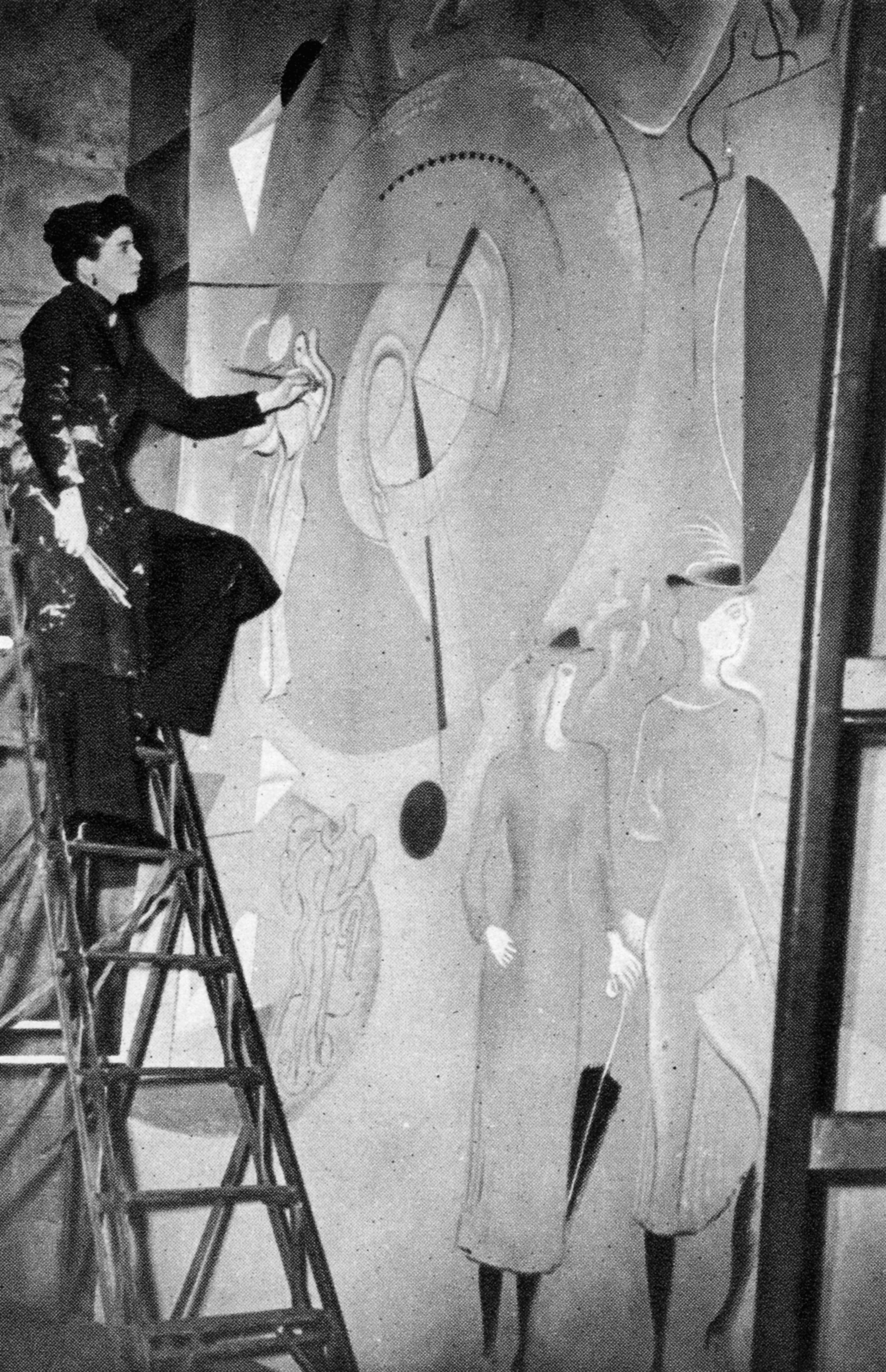 Mary Kessell painting a mural for Shell BP Pavillion in 1938. Credit Illustrated London News Ltd/Mary Evans