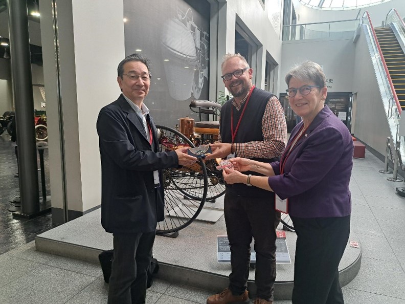 Jon Murden and Andrea Bishop With Naoaki Nunogaki Director Of Toyota Automobile Museum