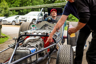 Allard Chrysler Dragster with driver and men pointing