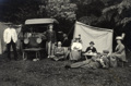 Caravan Club member hosts a Whit Sunday tea party beside his 45hp Mercedes motor car and tent outfit