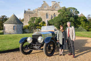 Lord and Lady Montagu with the 1914 Rolls-Royce Alpine Eagle outside Palace House